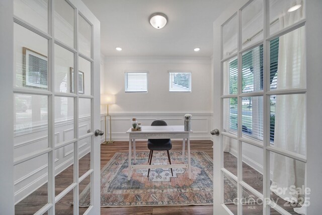 13222 Fiore Pl, Huntersville, NC 28078 - home office featuring wood finished floors, crown molding, wainscoting, and a decorative wall