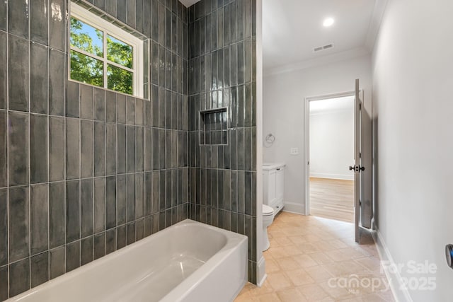 full bath with crown molding, baseboards, toilet, and shower / tub combination