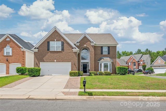 14104 Kendrick Cross Rd, Charlotte, NC 28273 - traditional home featuring driveway, an attached garage, brick siding, and a front yard