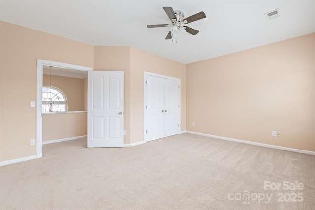14104 Kendrick Cross Rd, Charlotte, NC 28273 - unfurnished bedroom with carpet flooring, baseboards, a closet, and a ceiling fan