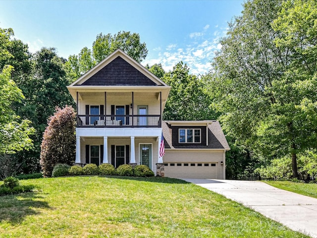 3801 Creek Ridge Dr, Denver, NC 28037 - view of front of house with a balcony, driveway, a front yard, a garage, and view of wooded area