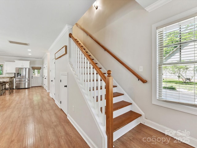 3801 Creek Ridge Dr, Denver, NC 28037 - staircase featuring crown molding, plenty of natural light, wood finished floors, baseboards, and recessed lighting