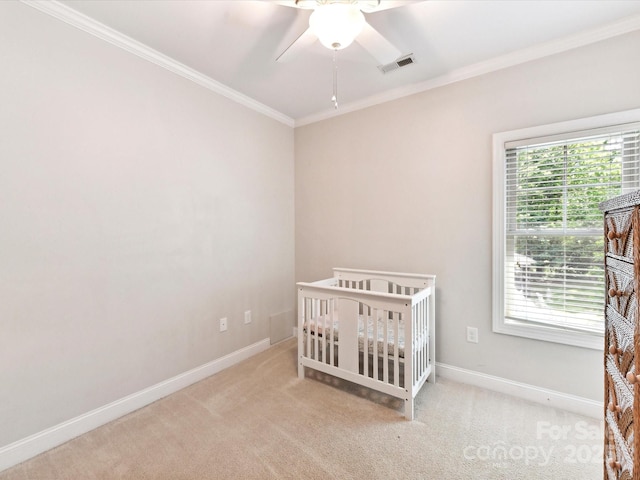 3801 Creek Ridge Dr, Denver, NC 28037 - bedroom featuring crown molding, baseboards, carpet floors, a ceiling fan, and a nursery area