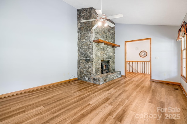 unfurnished living room featuring ceiling fan, wood finished floors, baseboards, and high vaulted ceiling
