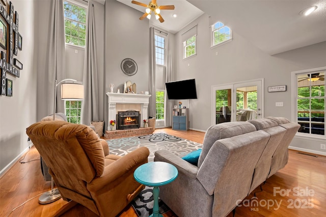 144 Chickasaw Dr, Shelby, NC 28152 - living room featuring ceiling fan, high vaulted ceiling, wood finished floors, baseboards, and recessed lighting