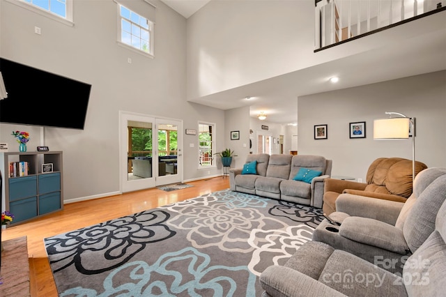144 Chickasaw Dr, Shelby, NC 28152 - living area with wood finished floors, a high ceiling, and baseboards