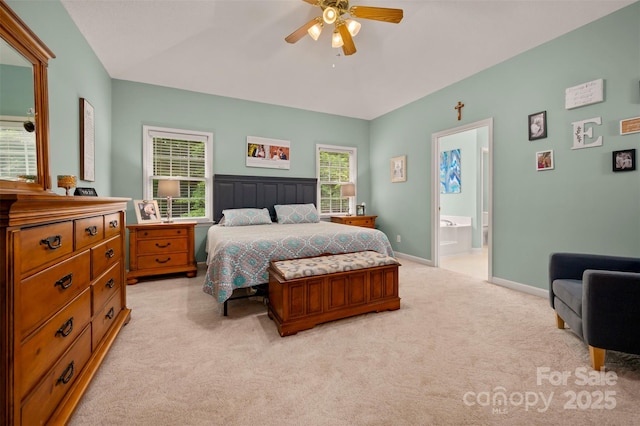 144 Chickasaw Dr, Shelby, NC 28152 - bedroom featuring light carpet, connected bathroom, baseboards, and a ceiling fan