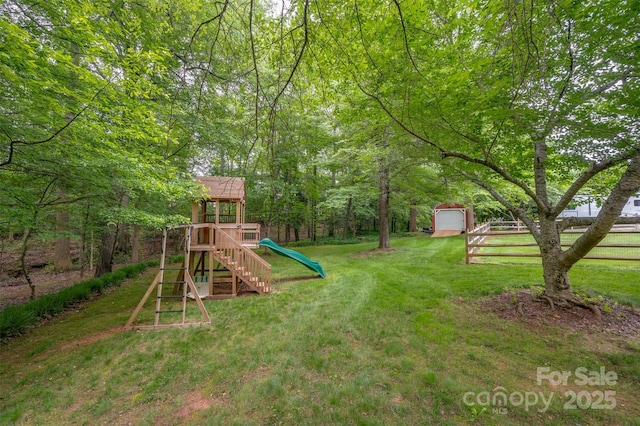 144 Chickasaw Dr, Shelby, NC 28152 - view of yard with a playground and an outbuilding