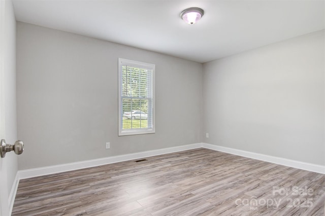 154 Stable Brook Ln, Taylorsville, NC 28681 - unfurnished room featuring wood finished floors and baseboards