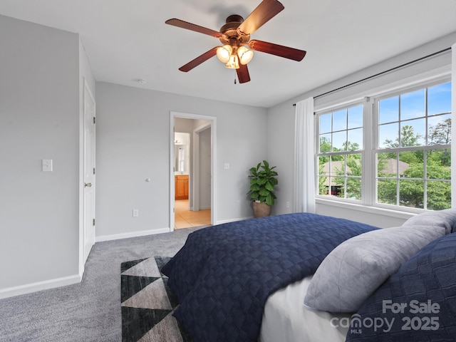 bedroom with carpet, baseboards, and ceiling fan