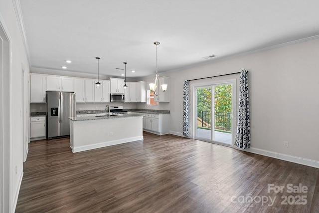 687 Cape Fear St, Fort Mill, SC 29715 - kitchen with stainless steel appliances, a sink, crown molding, recessed lighting, and baseboards