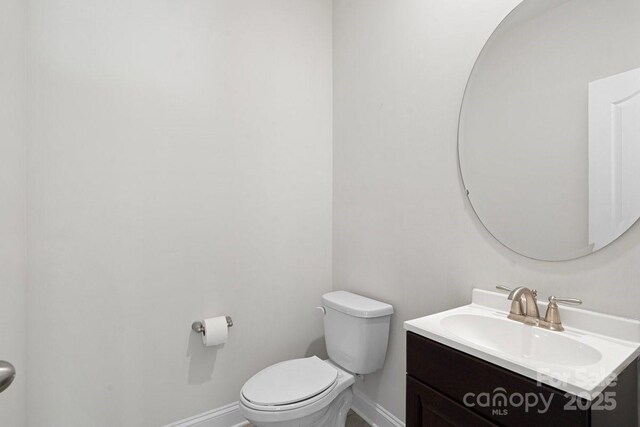 687 Cape Fear St, Fort Mill, SC 29715 - bathroom featuring baseboards, toilet, and vanity