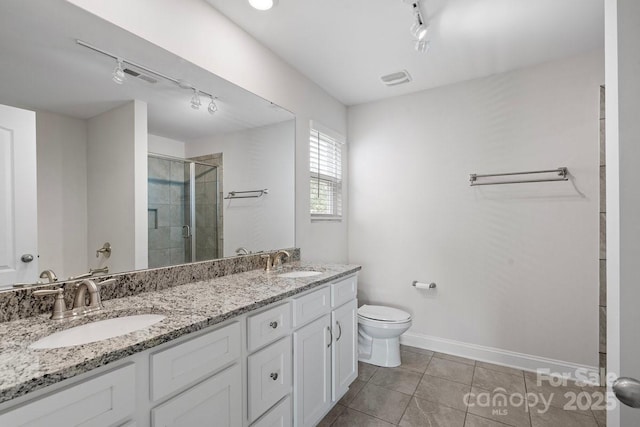 687 Cape Fear St, Fort Mill, SC 29715 - bathroom with track lighting, a stall shower, toilet, and tile patterned flooring