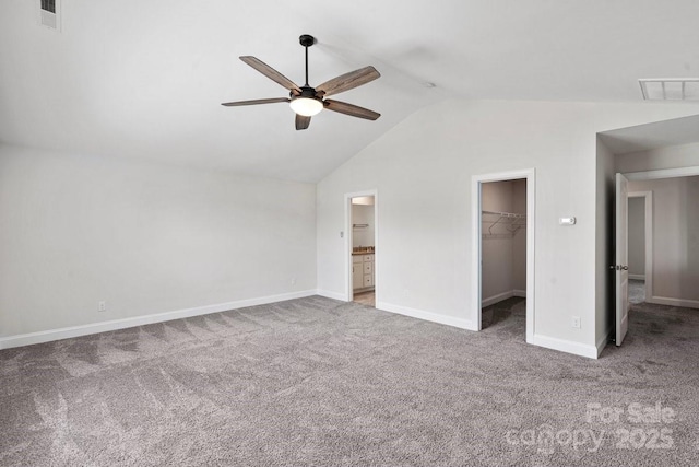 687 Cape Fear St, Fort Mill, SC 29715 - unfurnished bedroom with carpet floors, lofted ceiling, a walk in closet, baseboards, and a closet