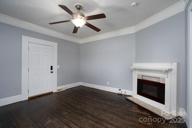 unfurnished living room featuring crown molding, dark wood finished floors, ceiling fan, baseboards, and a high end fireplace