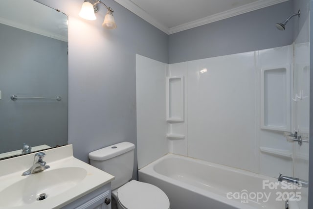bathroom with crown molding, vanity, washtub / shower combination, and toilet
