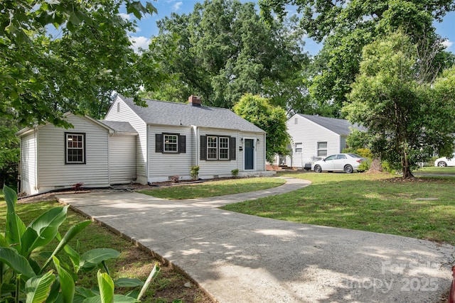 3920 Admiral Ave, Charlotte, NC 28205 - view of front of home with a front yard, a chimney, and a shingled roof