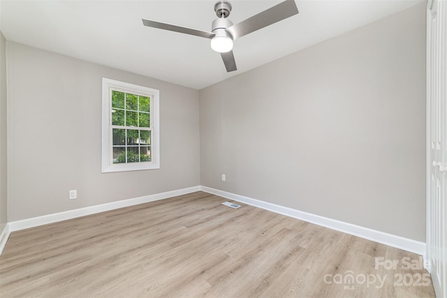 3920 Admiral Ave, Charlotte, NC 28205 - empty room with light wood finished floors, a ceiling fan, and baseboards