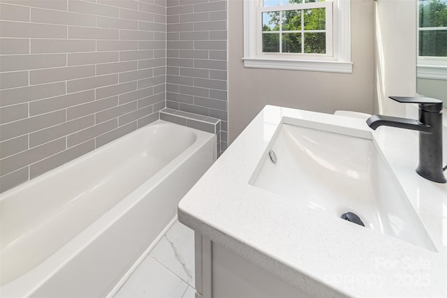 3920 Admiral Ave, Charlotte, NC 28205 - bathroom featuring plenty of natural light, marble finish flooring, vanity, and  shower combination