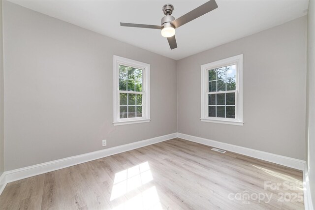 3920 Admiral Ave, Charlotte, NC 28205 - empty room featuring wood finished floors, baseboards, and ceiling fan