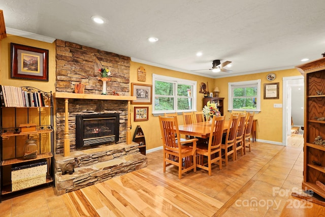751 Millers Pond Ln, Boone, NC 28607 - dining space featuring a ceiling fan, recessed lighting, ornamental molding, a fireplace, and a textured ceiling