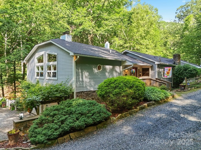 751 Millers Pond Ln, Boone, NC 28607 - view of home's exterior featuring a chimney
