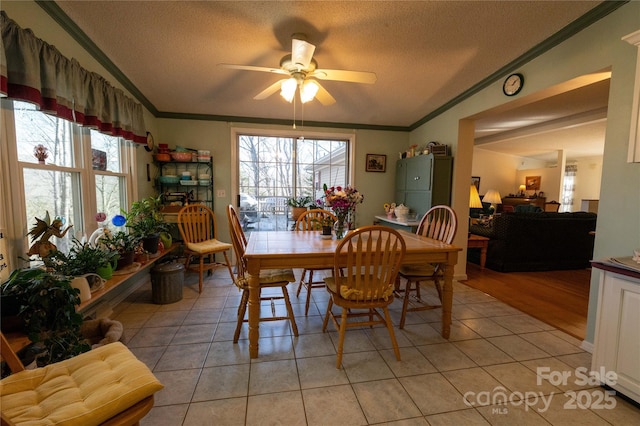 120 Powderhorn Dr, Burnsville, NC 28714 - dining room with ornamental molding, light tile patterned flooring, a textured ceiling, and ceiling fan