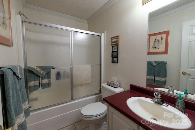 120 Powderhorn Dr, Burnsville, NC 28714 - full bathroom with ornamental molding, vanity, bath / shower combo with glass door, toilet, and tile patterned flooring