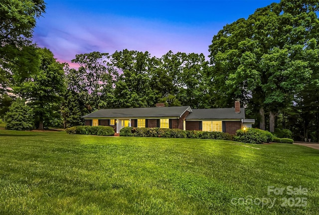 90 Pinewood Rd, Granite Falls, NC 28630 - single story home with a garage, a chimney, and a front lawn