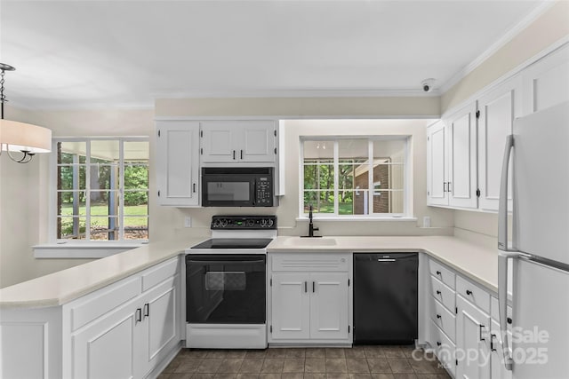90 Pinewood Rd, Granite Falls, NC 28630 - kitchen with black appliances, a sink, plenty of natural light, light countertops, and ornamental molding