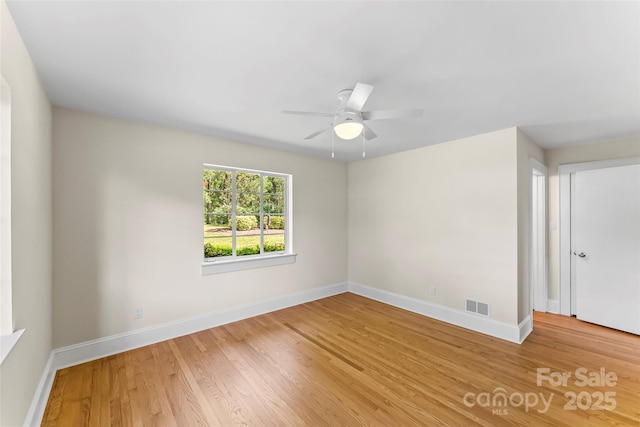 90 Pinewood Rd, Granite Falls, NC 28630 - unfurnished room with light wood-style flooring, baseboards, and a ceiling fan