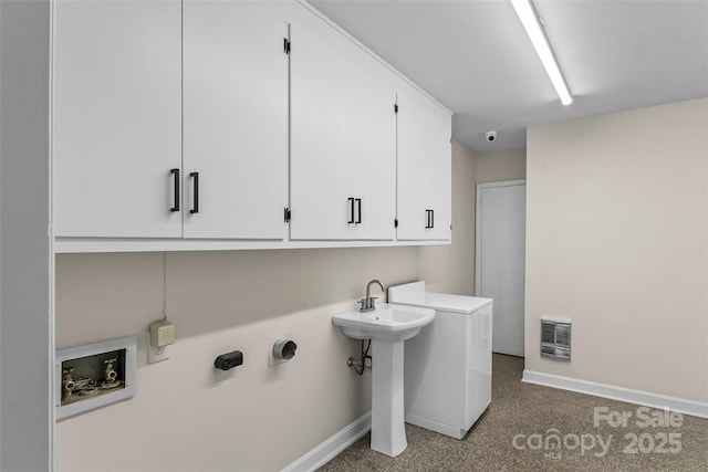 90 Pinewood Rd, Granite Falls, NC 28630 - laundry area featuring cabinet space, baseboards, and washer / clothes dryer