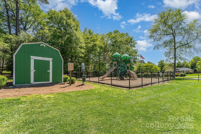 community jungle gym with a shed and an outbuilding