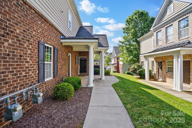 11209 Lazio Ln Unit 1, Charlotte, NC 28277 - view of grassy yard with covered porch