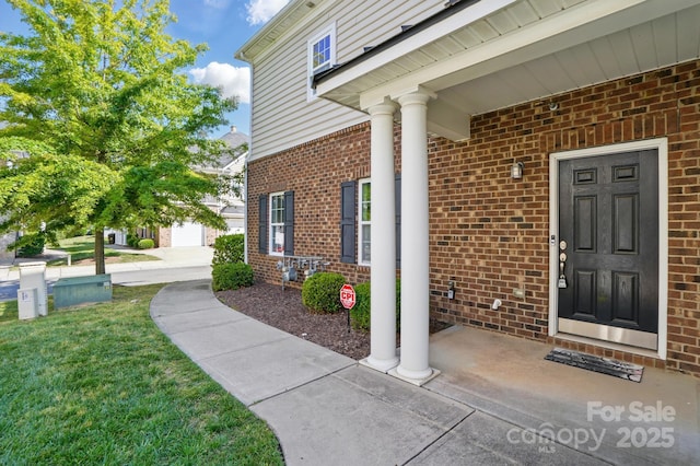 11209 Lazio Ln Unit 1, Charlotte, NC 28277 - entrance to property with brick siding and a lawn