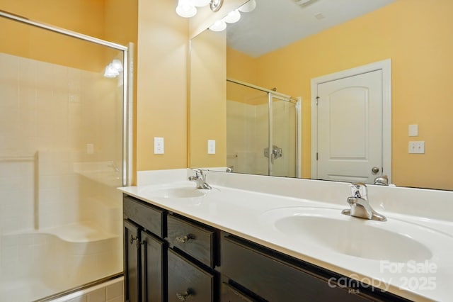 11209 Lazio Ln Unit 1, Charlotte, NC 28277 - bathroom featuring a stall shower and double vanity