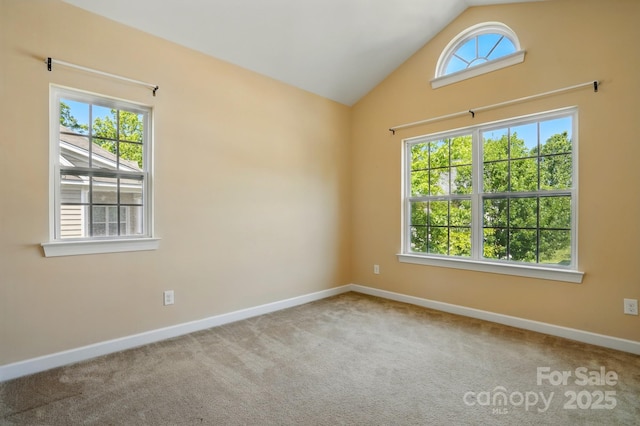 11209 Lazio Ln Unit 1, Charlotte, NC 28277 - unfurnished room featuring baseboards, lofted ceiling, and carpet