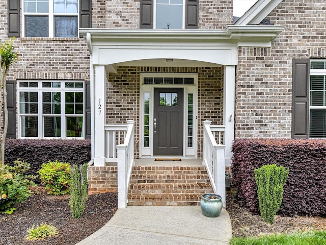 129 Overlook Ridge Ln, Davidson, NC 28036 - doorway to property featuring brick siding