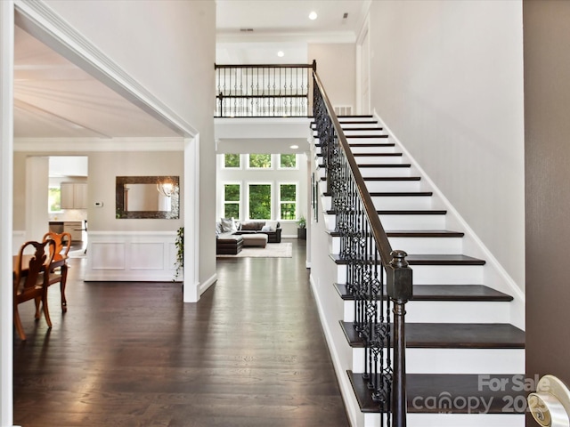 129 Overlook Ridge Ln, Davidson, NC 28036 - stairs with crown molding, wood finished floors, a high ceiling, and recessed lighting