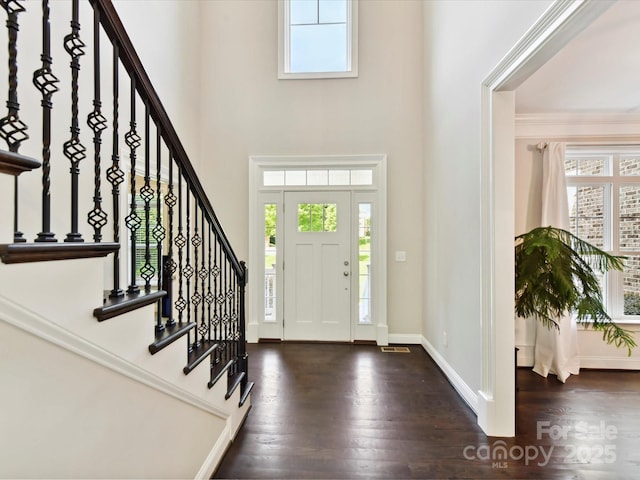 129 Overlook Ridge Ln, Davidson, NC 28036 - foyer with a high ceiling, wood finished floors, plenty of natural light, and stairs