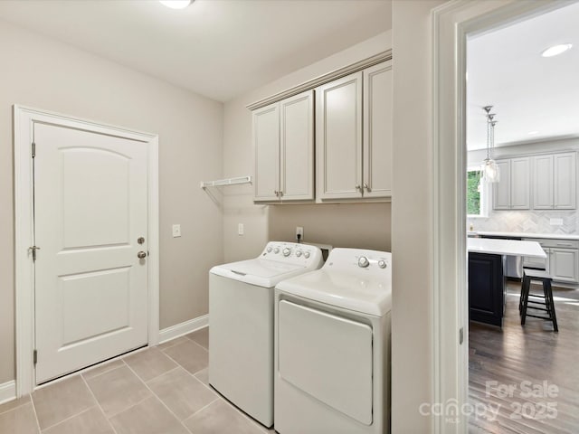 129 Overlook Ridge Ln, Davidson, NC 28036 - laundry room with washing machine and clothes dryer, cabinet space, baseboards, light tile patterned floors, and recessed lighting
