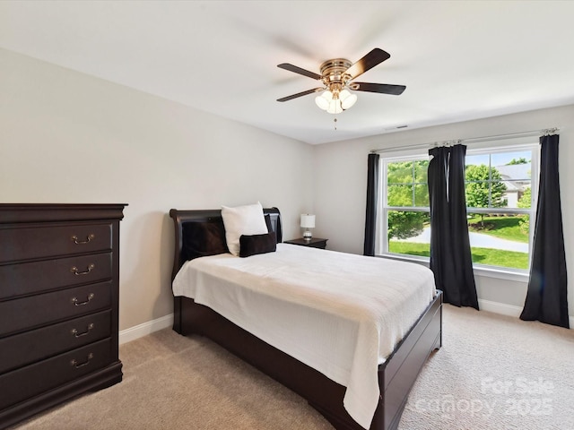 129 Overlook Ridge Ln, Davidson, NC 28036 - bedroom with light carpet, baseboards, and a ceiling fan