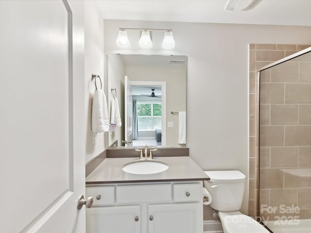 129 Overlook Ridge Ln, Davidson, NC 28036 - ensuite bathroom featuring a tile shower, vanity, and toilet