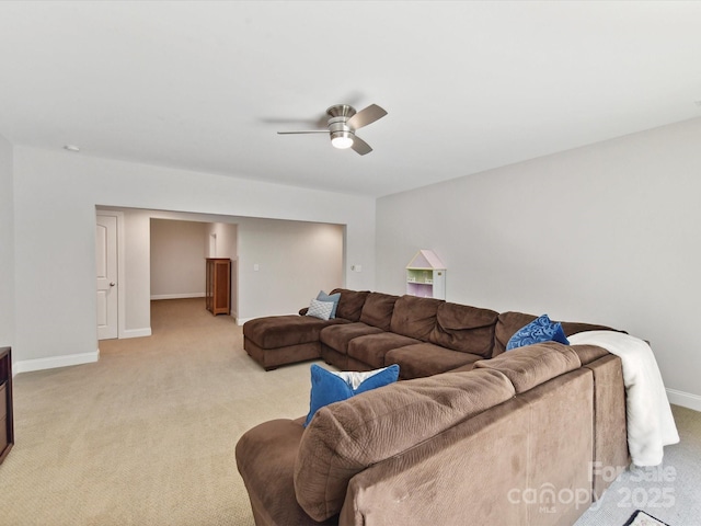 129 Overlook Ridge Ln, Davidson, NC 28036 - living area featuring light carpet, ceiling fan, and baseboards