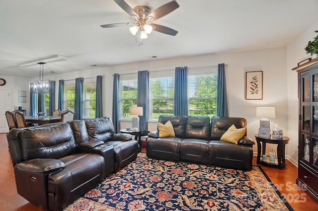 14316 Baytown Ct, Huntersville, NC 28078 - living area with a ceiling fan, wood finished floors, baseboards, and a chandelier
