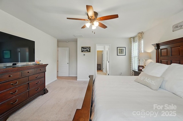 14316 Baytown Ct, Huntersville, NC 28078 - bedroom with light colored carpet, baseboards, and ceiling fan