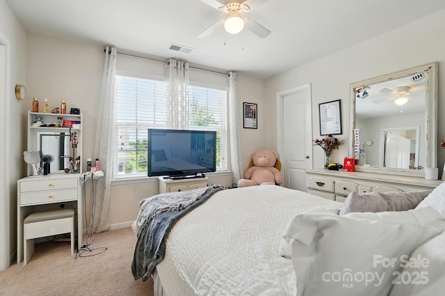 14316 Baytown Ct, Huntersville, NC 28078 - bedroom featuring multiple windows, light colored carpet, baseboards, and a ceiling fan