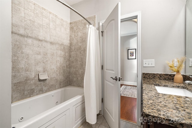 5214 Polo Gate Blvd, Charlotte, NC 28216 - bathroom featuring a combined bath / shower with jetted tub, vanity, and tile patterned flooring