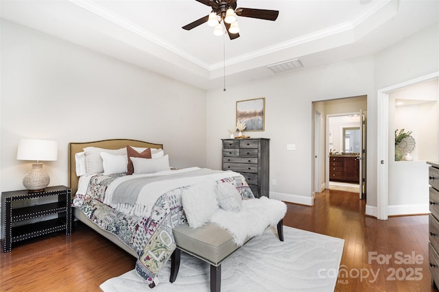 5214 Polo Gate Blvd, Charlotte, NC 28216 - bedroom featuring a tray ceiling, hardwood / wood-style flooring, ornamental molding, baseboards, and a ceiling fan