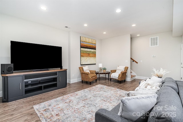 5214 Polo Gate Blvd, Charlotte, NC 28216 - living area with baseboards, stairs, wood finished floors, and recessed lighting
